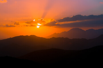 mountain sunset with dramatic clouds