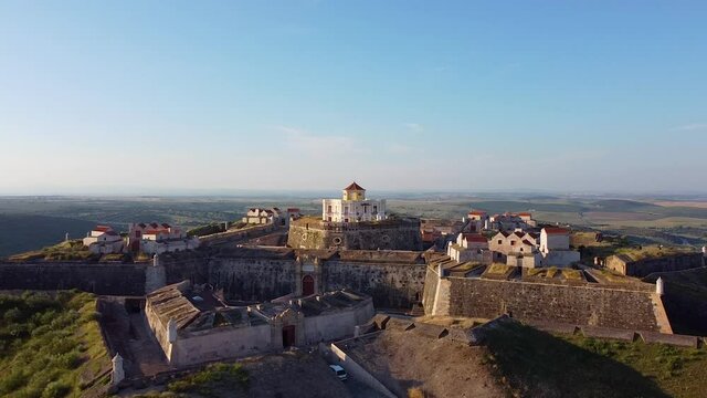 Aerial view of fortified village on hill in Portugal.