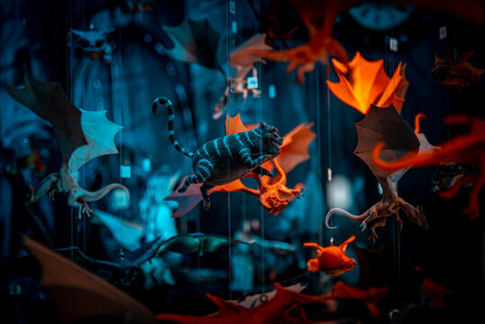 Cheshire cat and other colorful hanging toys. Flying characters from fantasy movies of magic on a shallow depth of field