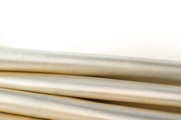 The material is shiny lying in the folds. Background. Place for text
