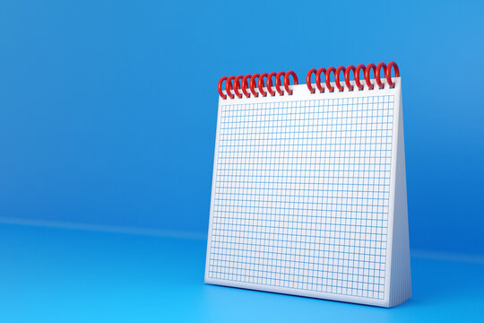 3D ilustration empty desk calendar , loose-leaf notebook on  blue table on monocrome background. Mockup design concept. 3D rendering