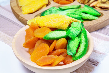 Nutritious Energy Snack Dry fruit. mango, raisins, papaya, bananas, dried apricots. Healthy vegetarian food.