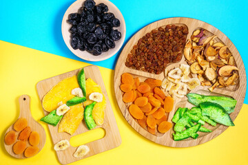Nutritious Energy Snack. Dry fruit. Flat lay. mango, raisins, papaya, bananas, dried apricots. Healthy vegetarian food.
