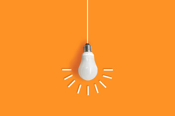 Hanging light bulb.  business idea concept on isolated background