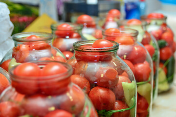 Pickled tomatoes in 3-liter bottles for long-term storage in the cellar.