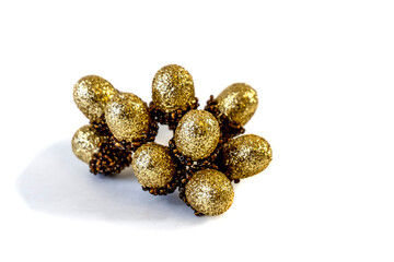 Christmas shiny twigs with berries and nuts, ornament for a Christmas tree, holiday decorations isolated on white background