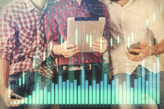 Double exposure of forex graph drawing and man and woman working together holding and using a mobile device. Trade concept.