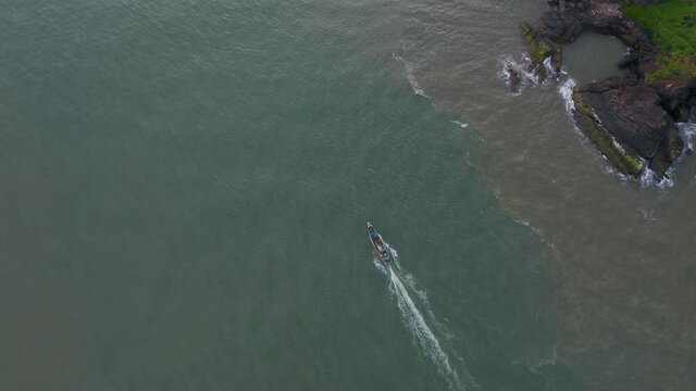 Aerial top down view boats on sea, Goa, India.