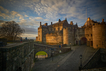 Sunset in entry of Stirling castle in Autumn with clouds in the background