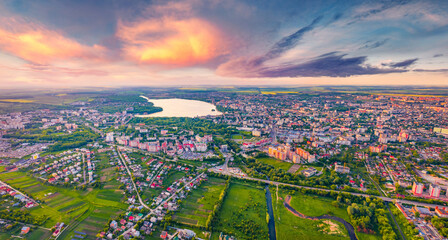 Fototapeta premium Stunning summer view from flying drone of Ternopil town. Picturesque evening cityscape of Ternopil, Ukraine, Europe. Traveling concept background.