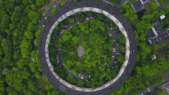 evening moscow cityscape famous round apartment building aerial flight over panorama 4k russia