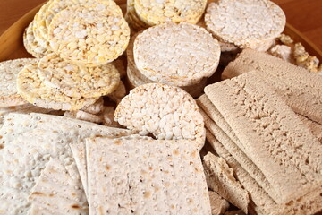 Different types of crispbread. Rice cake, Corn Thins, Matzo, Rye Crispbread.