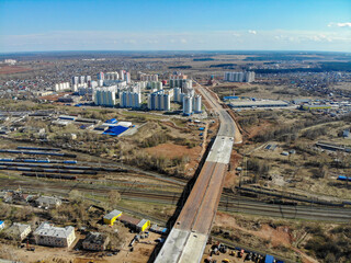 Aerial view of the construction of a bridge over the railway in the city of Kirov