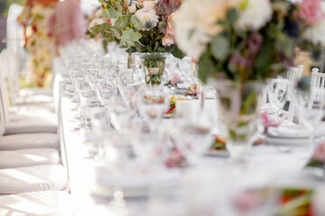 Wedding table with flowers for the newlyweds