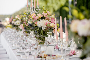 Wedding table with flowers for the newlyweds