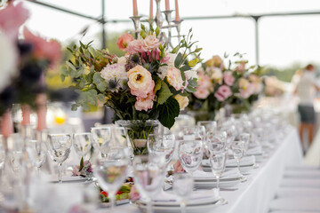 Wedding table with flowers for the newlyweds