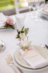 Wedding table with flowers for the newlyweds