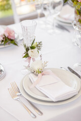 Wedding table with flowers for the newlyweds