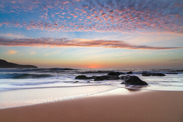 Beautiful sunrise with high cloud at the seaside