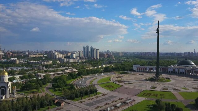 sunny day moscow city poklonnaya hill park cityscape aerial flight over panorama 4k russia