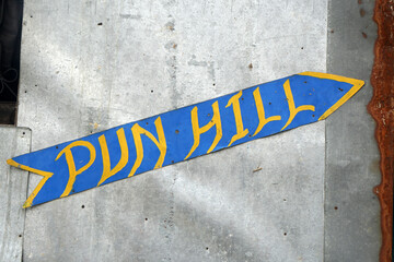 Poon hill or Pun hill guide post arrow sign on the way at Ghorepani village Nepal - Travel Hiking and Trekking concept 