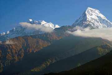 Nature Landscape of Top of Mt. Machapuchare is a mountain in the Annapurna Himalayas of north central Nepal seen from Poon Hill, Nepal - trekking route to ABC - Adventure Backpacking outdoor 