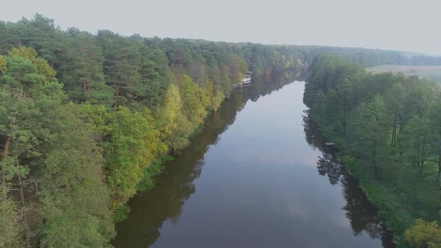 Autumn forest and river aerial view