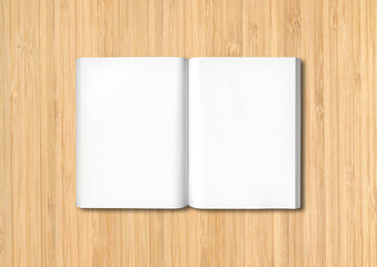 Open book isolated on wooden