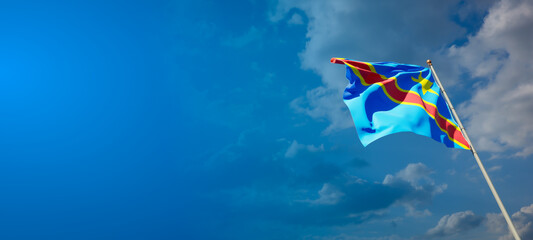 Beautiful national state flag of Congo with blank space. Congo flag on wide background with place for text 3D artwork.