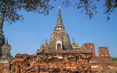 Sculpture of Three 3 Ancient old pagoda with the tourist at Wat Phra Si Sanphet is best Famous Landmark old History Buddhist temple in Ayutthaya , Thailand