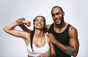Fitness couple relaxing after workout