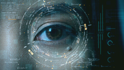 Futuristic biometric retina recognition algorithm technology scanning a young teenager's pupil with...