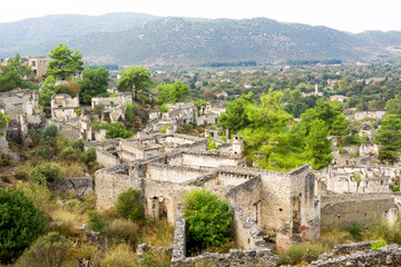 Fototapeta na wymiar Landmark of Turkey. The abandoned old Greek city of Kayakoy on the Lycian Trail.