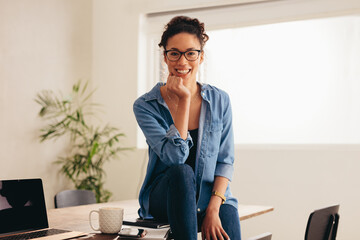 Woman sitting at home office