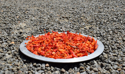 Red hot chilies out in the sun to dry