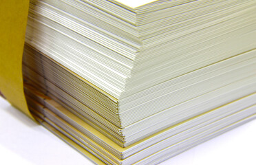 Stack of documents, papers, notes, commercials.
