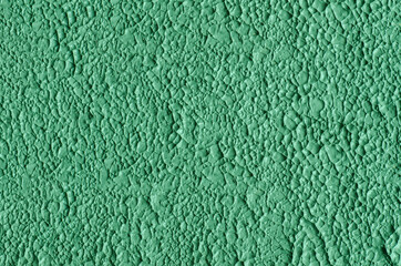 Green cosmetic clay (kelp facial mask, face cream, spirulina body wrap) texture close up, selective focus. Abstract background.