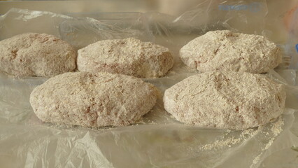raw meat cutlets on the table