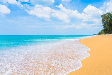 Beautiful tropical beach sea ocean with white cloud and blue sky