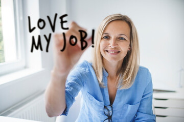 Businesswoman drawing Love my Job
