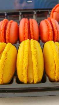 Red and yellow macaroon sweets 