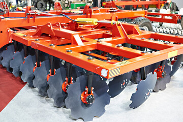Trailed in-line disc harrow at agricultural exhibition