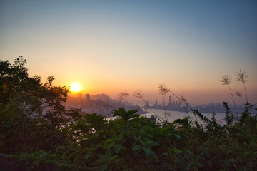 sunset over the sea of Victoria Harbour from Devil's Peak, Yau Tong, Hong Kong