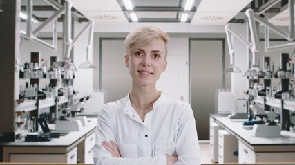 Portrait of 30s Middle Eastern female science worker posing in a laboratory