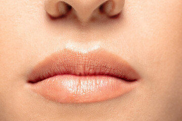Lips. Close up portrait of beautiful jewish female model. Parts of face and body. Beauty, fashion,...