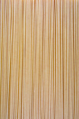 background from spaghetti. a bundle of spaghetti.