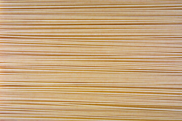 background from spaghetti. a bundle of spaghetti.