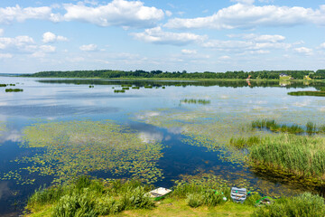 Obraz na płótnie Canvas Landscape with lake and blue sky