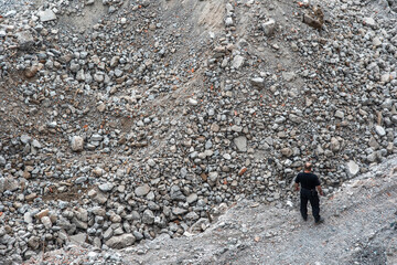 Stone ruins after the demolition of the old building. Liberation of the territory for new development