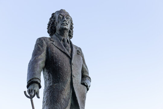 CADAQUES, SPAIN-AUGUST 8, 2020: Salvador Dali's standing with the cane statue by Joaquim Ros i Sabate